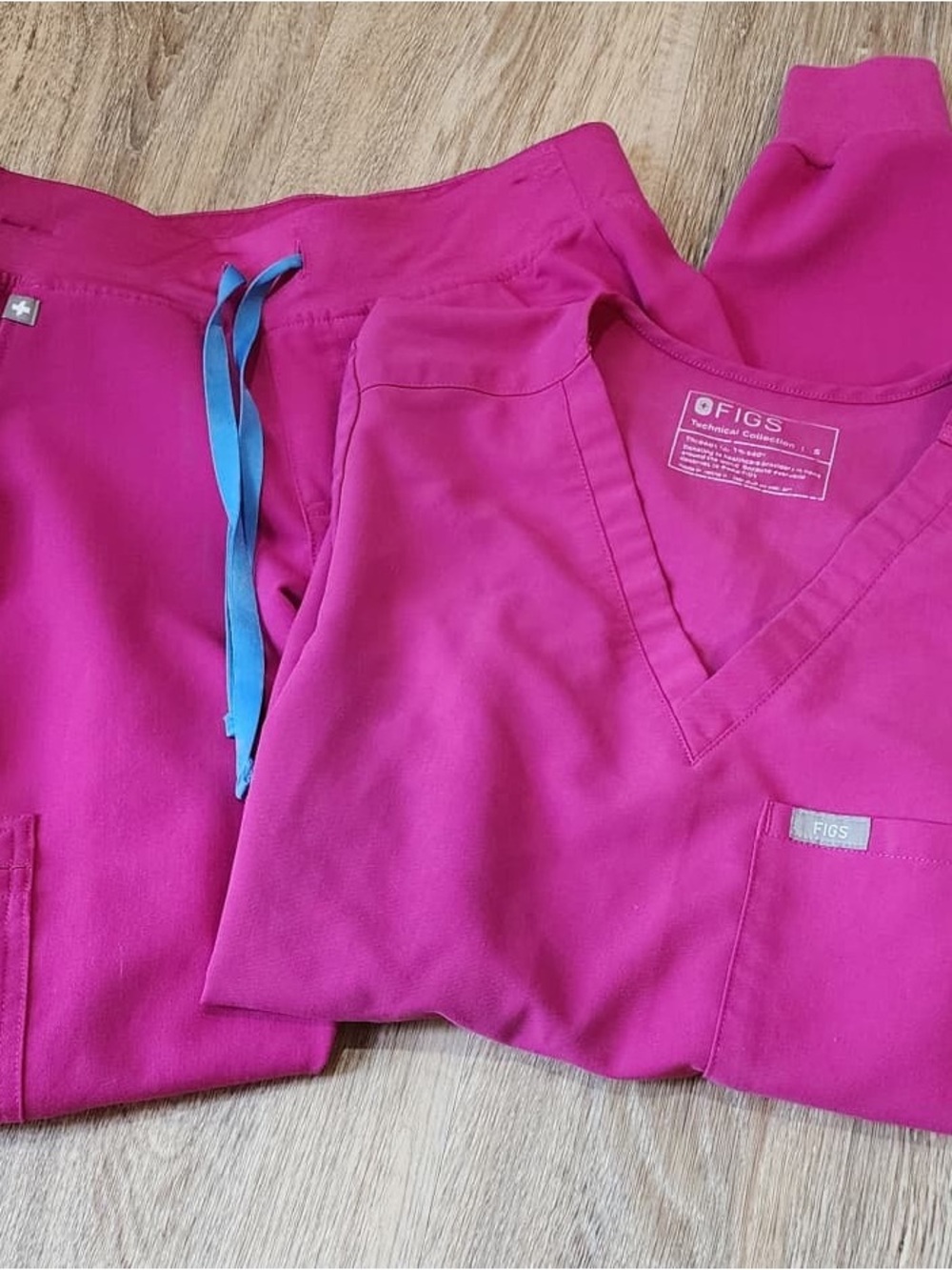 FIGS Women's Track Jogger Scrubs in Bright Fuchsia with Blue Drawstring